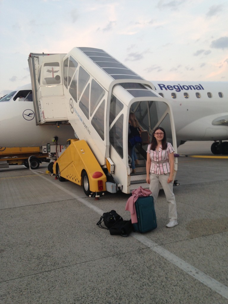 Nina Horvath at the airport in Linz, Austria in front of the first plane she took.